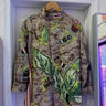 Snobiety Jacket
One-of-a-kind reclaimed camo jacket, hand-embroidered with vintage floral embroidery 