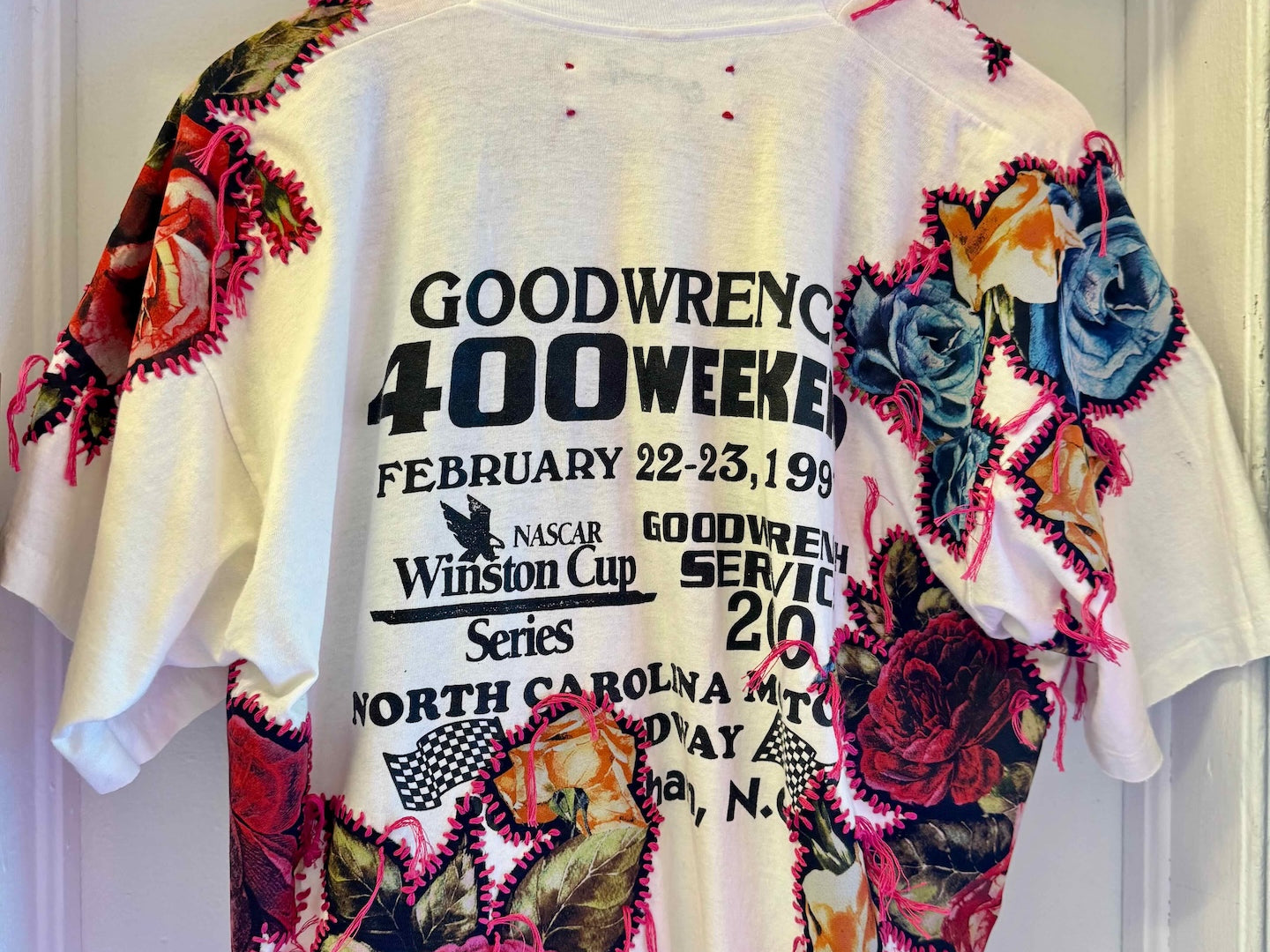 One-of-a-kind upcycled t-shirt with hand-stitched floral embroidery by Gontovnik