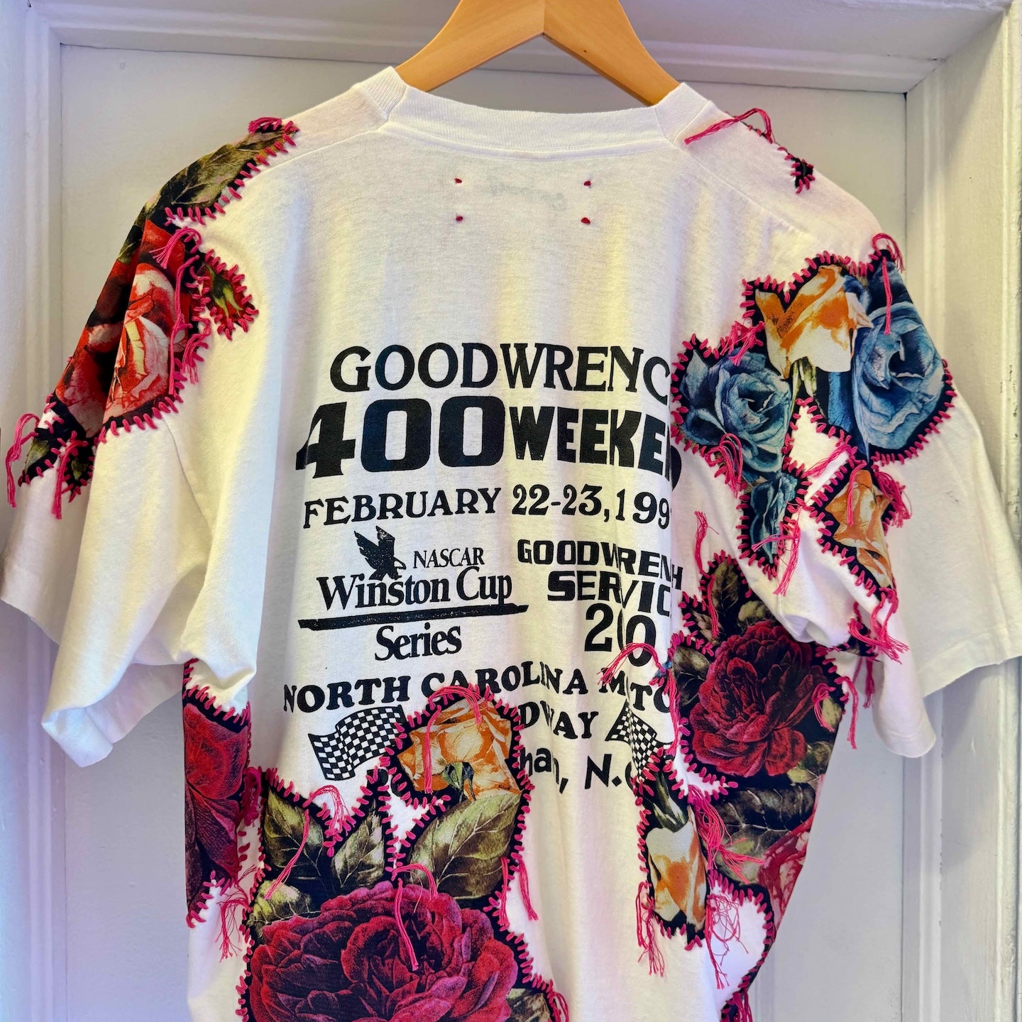 One-of-a-kind upcycled t-shirt with hand-stitched floral embroidery by Gontovnik