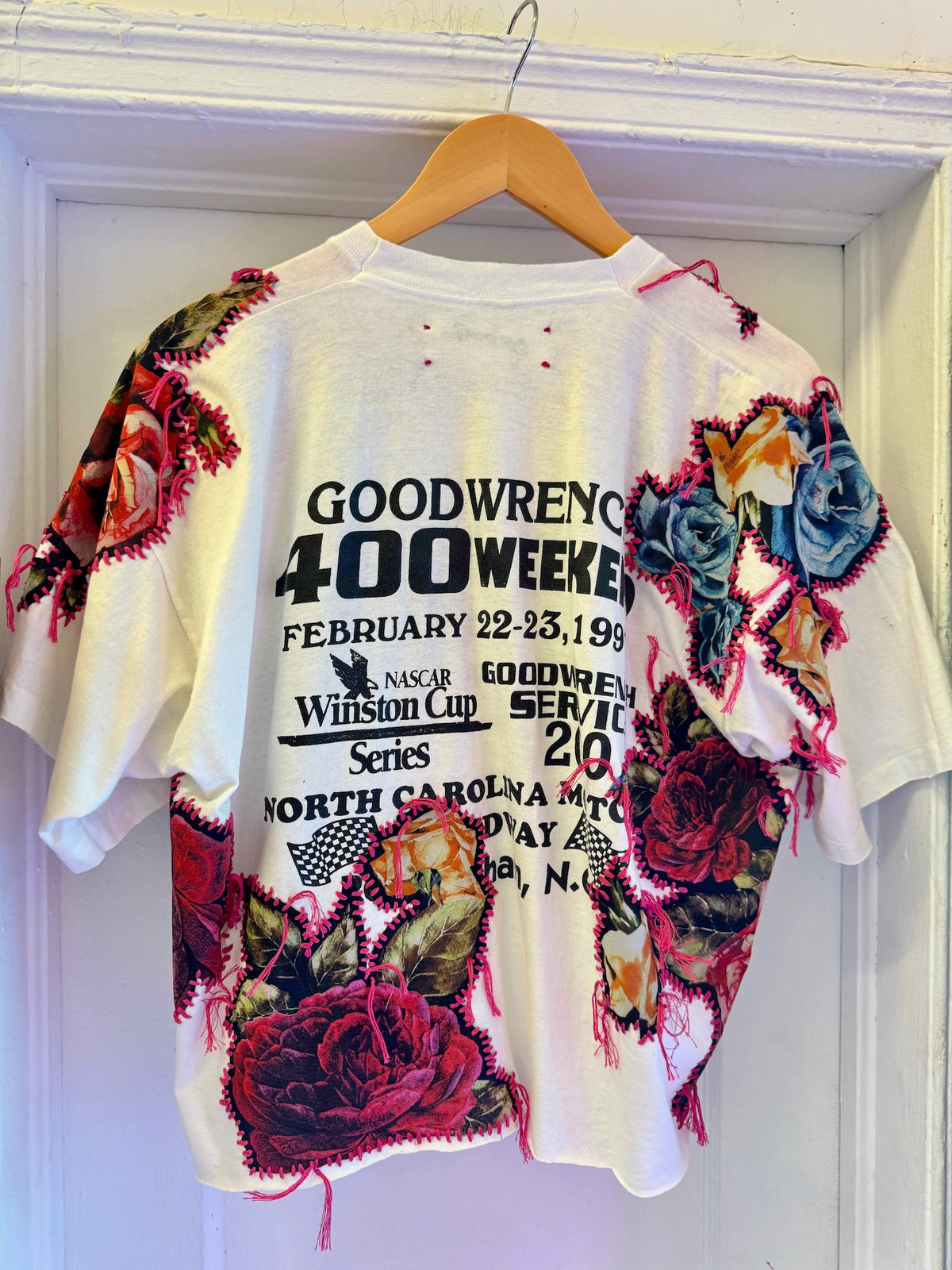 One-of-a-kind upcycled t-shirt with hand-stitched floral embroidery by Gontovnik