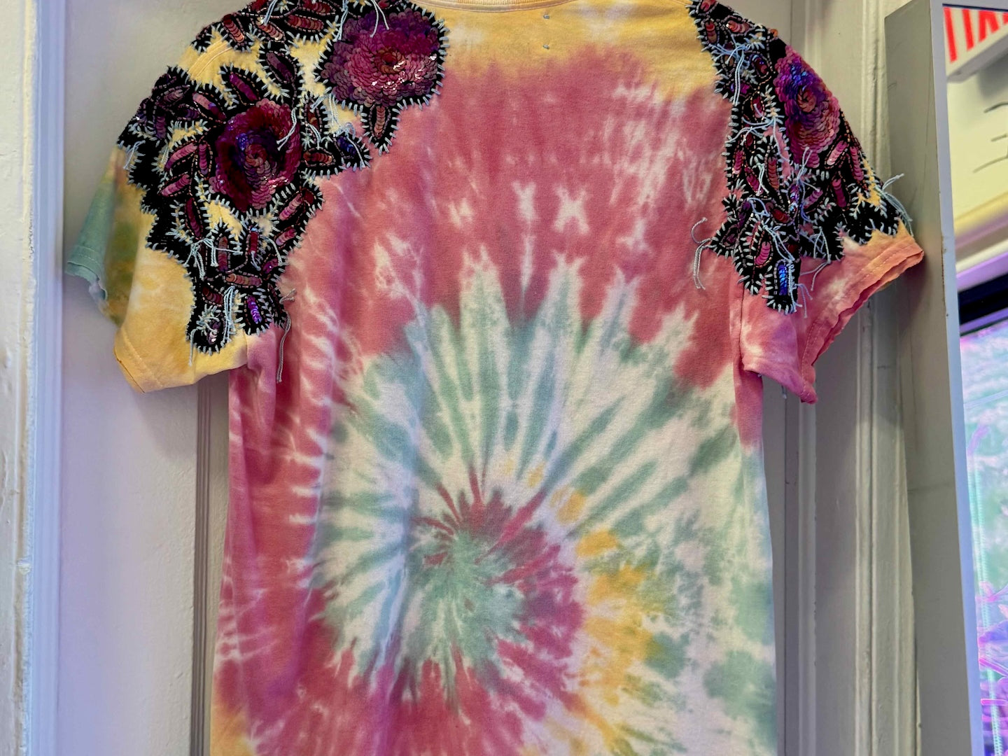 One-of-a-kind upcycled tie-dye Snoopy t-shirt with hand-embroidered sequin flowers by Gontovnik