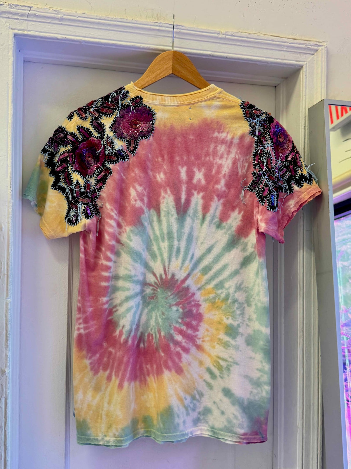 One-of-a-kind upcycled tie-dye Snoopy t-shirt with hand-embroidered sequin flowers by Gontovnik