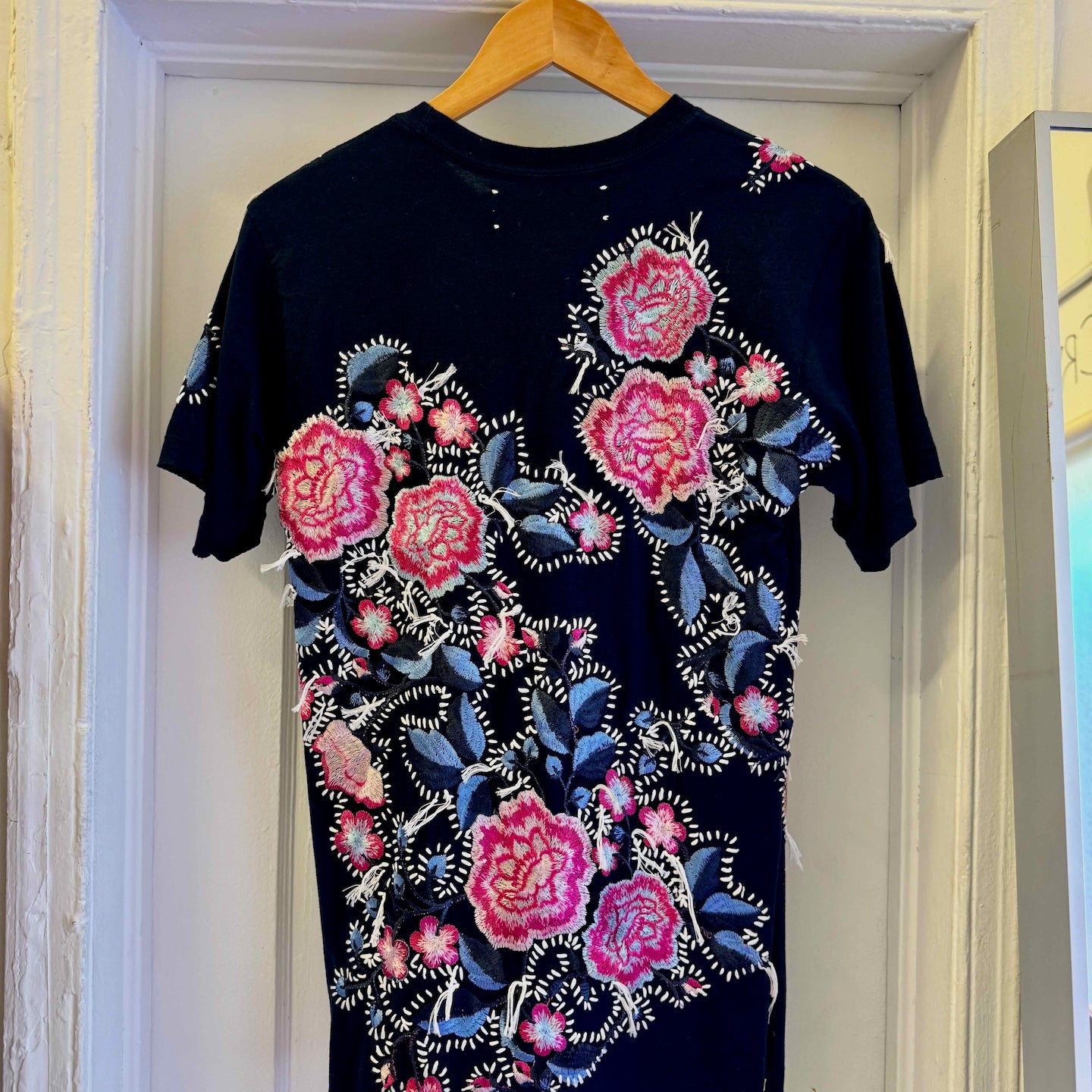 The Floridian Mickey T-Shirt
One-of-a-kind reclaimed t-shirt, hand-embroidered with vintage floral embroidery 