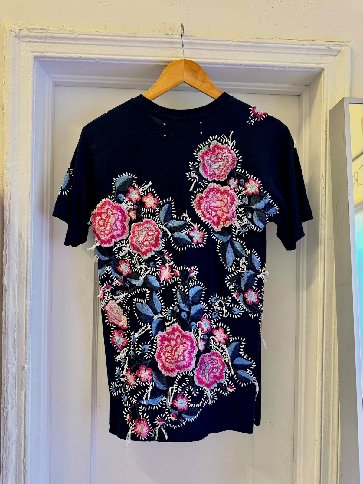 The Floridian Mickey T-Shirt
One-of-a-kind reclaimed t-shirt, hand-embroidered with vintage floral embroidery 