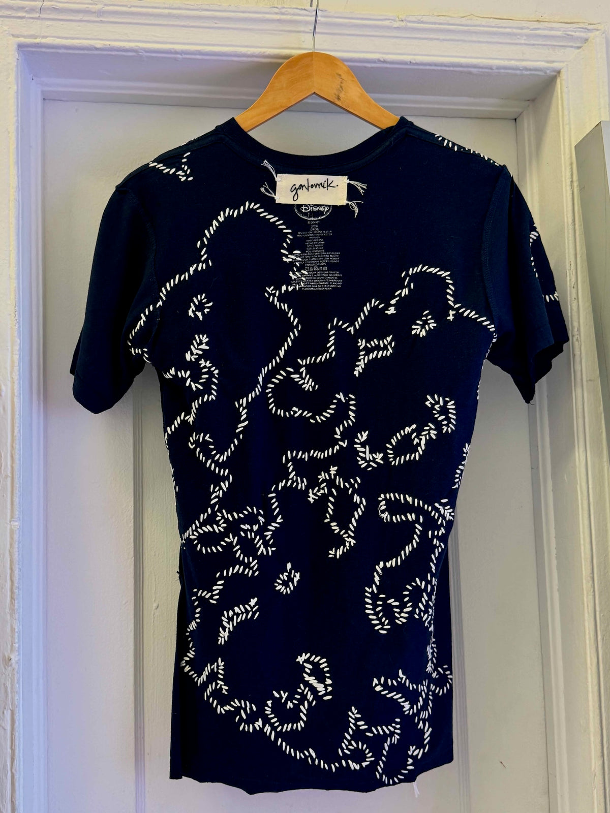 The Floridian Mickey T-Shirt
One-of-a-kind reclaimed t-shirt, hand-embroidered with vintage floral embroidery 