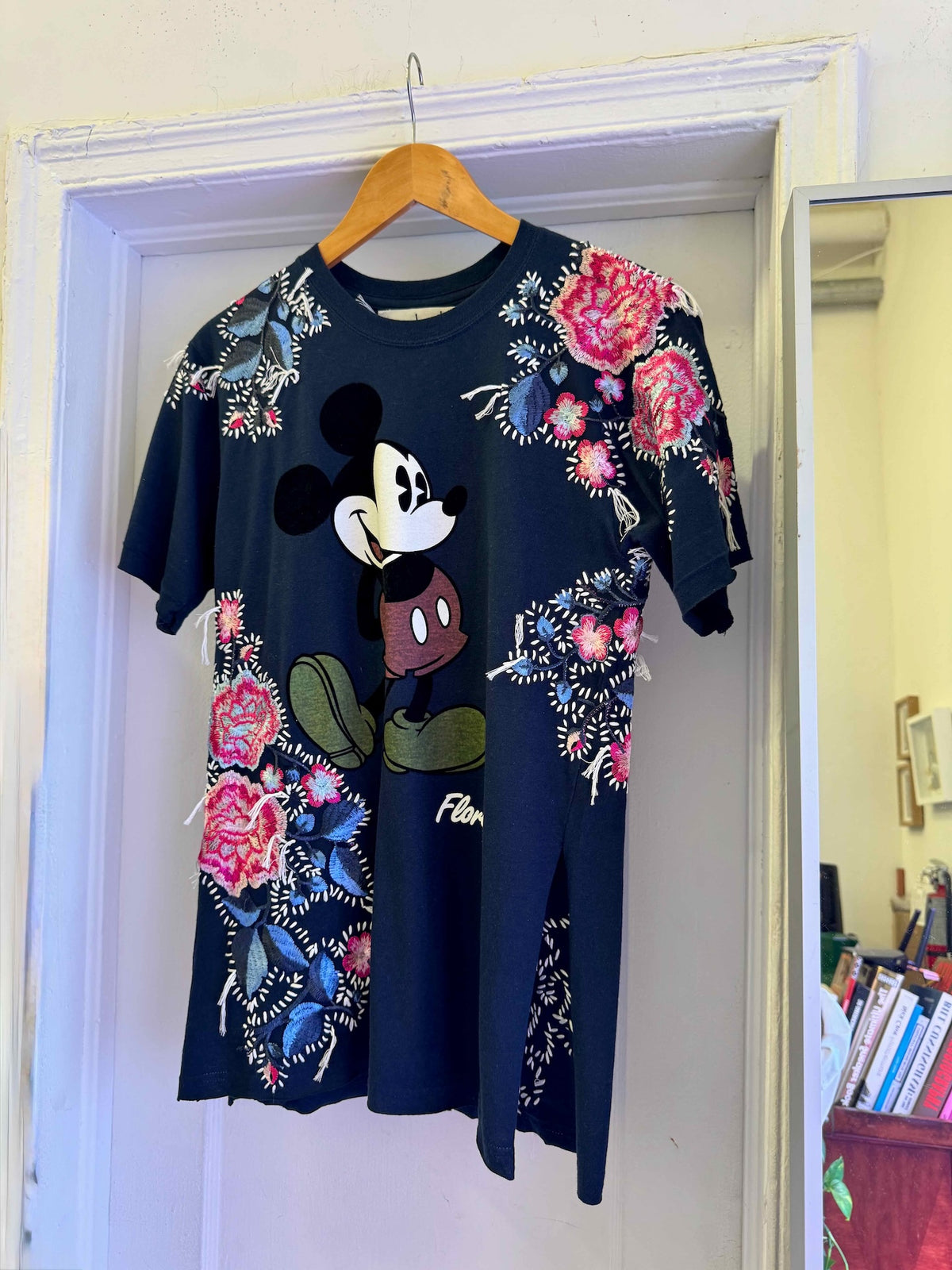 The Floridian Mickey T-Shirt
One-of-a-kind reclaimed t-shirt, hand-embroidered with vintage floral embroidery 