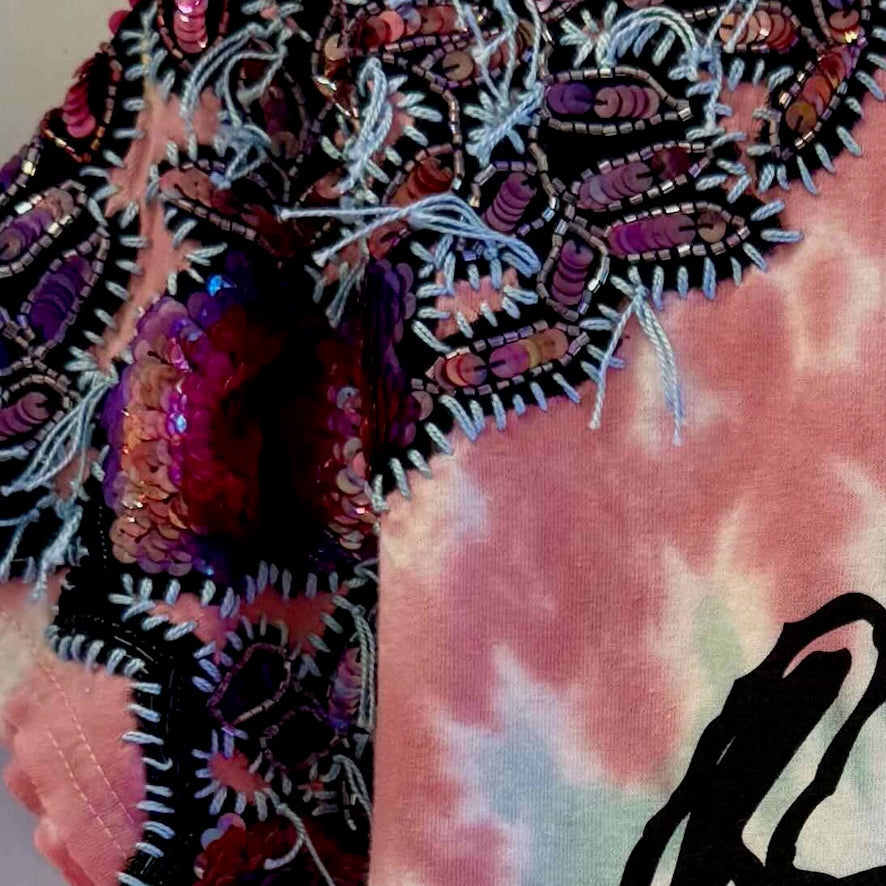 One-of-a-kind upcycled tie-dye Snoopy t-shirt with hand-embroidered sequin flowers by Gontovnik