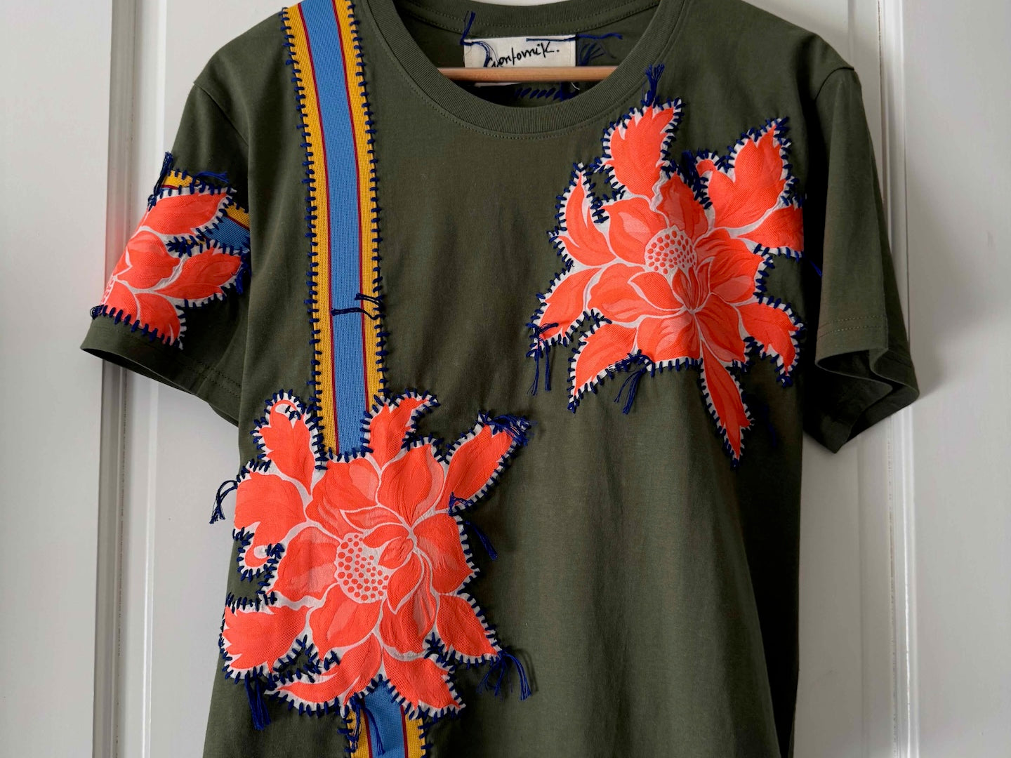 One-of-a-kin upcycled cotton t-shirt with hand-stitched floral embroidery by Gontovnik