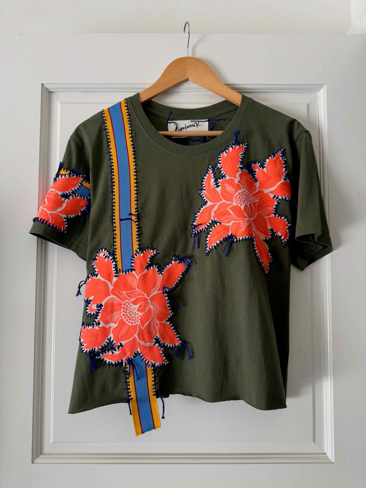 One-of-a-kin upcycled cotton t-shirt with hand-stitched floral embroidery by Gontovnik